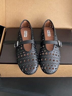 Alaïa Black Laser‑Cut Perforated Leather Mary Jane Flats Women